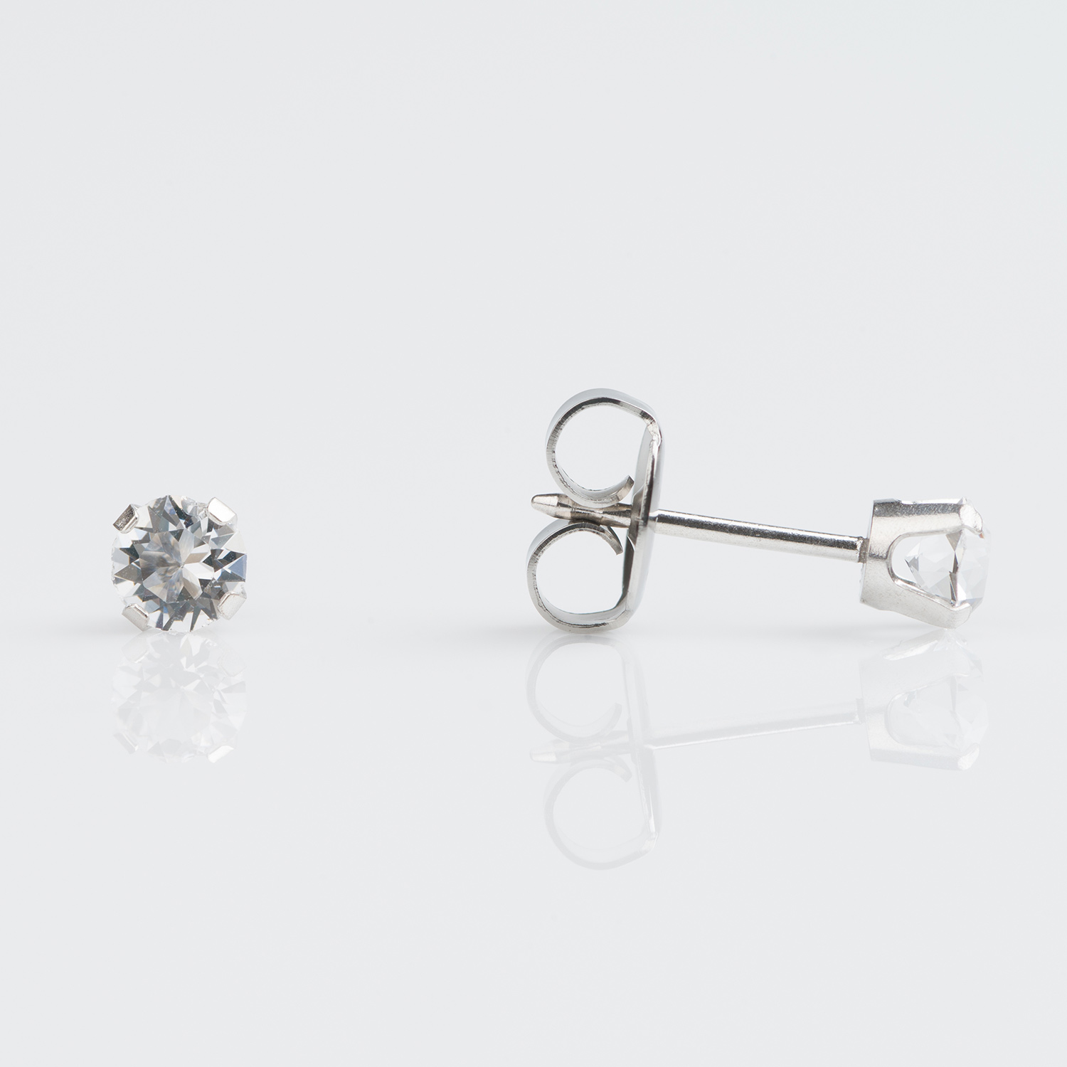 System 75™ 4mm 9K White Gold Prong-Set Clear Crystal Piercing Studs