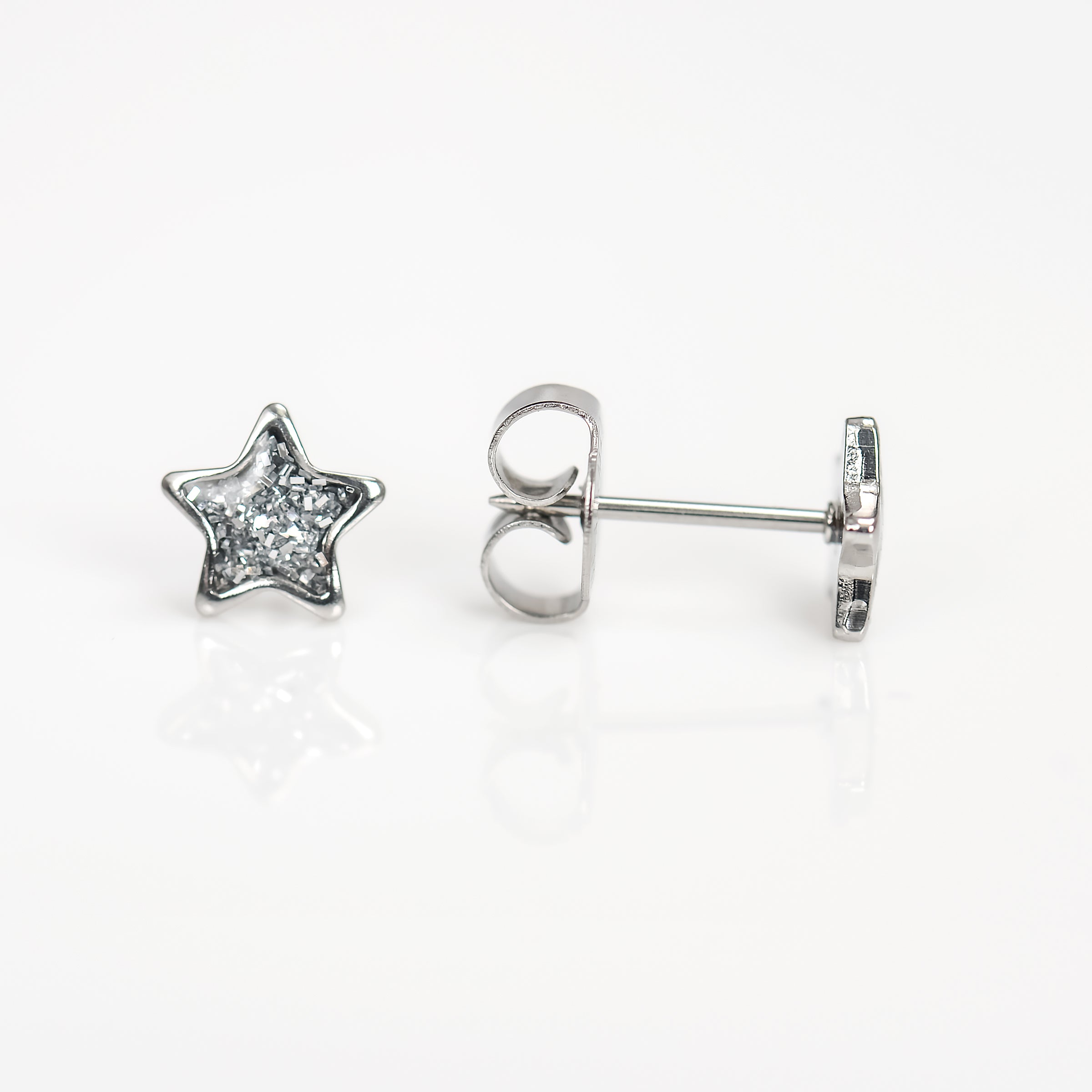 System 75™ 7mm Stainless Steel Clear Glitter Star Piercing Studs
