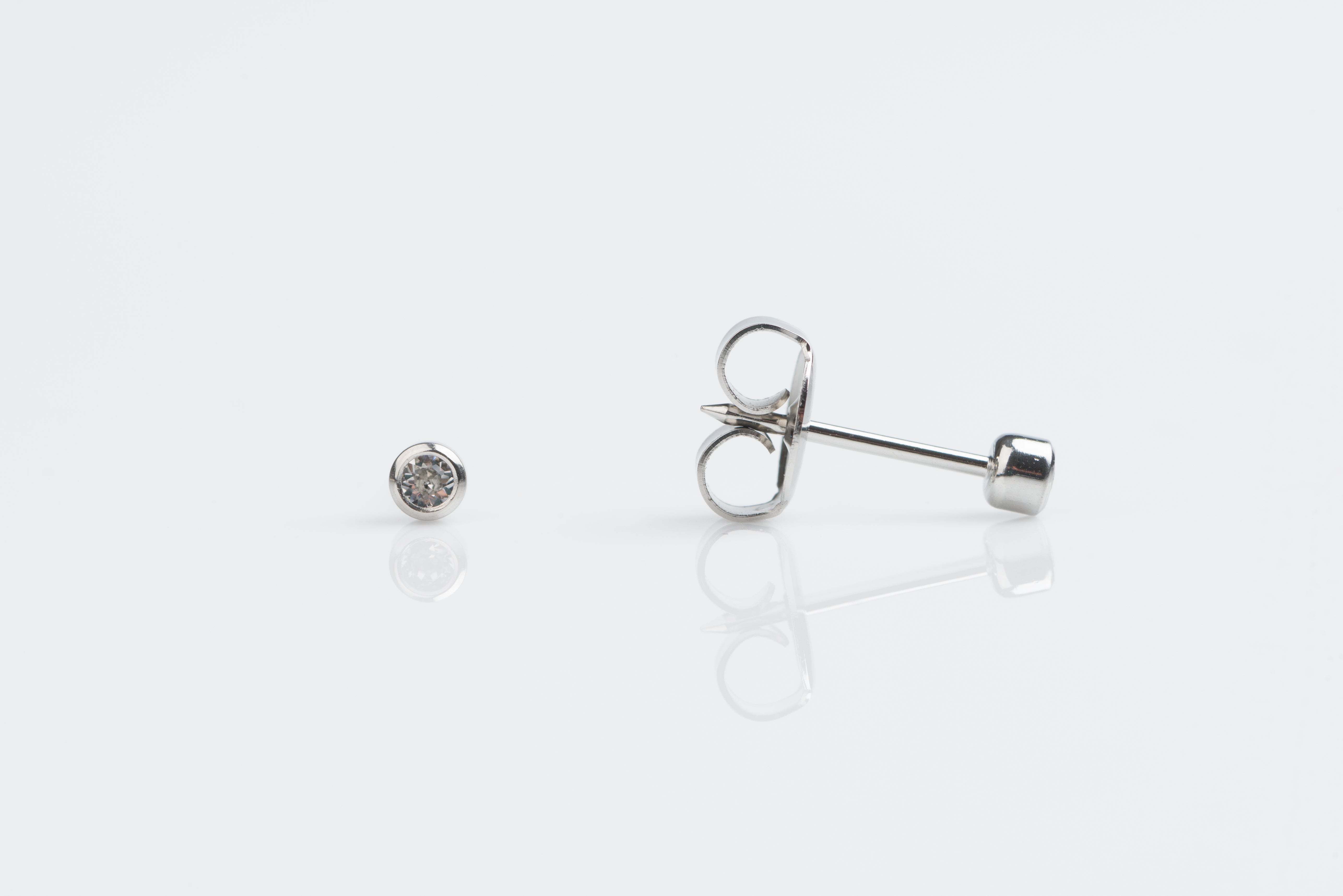 System 75™ 2mm Stainless Steel Bezel-Set Clear Crystal Piercing Studs